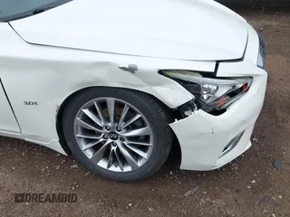 2018 Infiniti Q50 Luxe z VIN JN1EV7AR3JM445195, wystawiony jako IAAI lot #42228587 z przebiegiem 122 575 mil mil oraz . Historia ofert i sprzedaży dostępna na DreamBid. Obrazek 6.