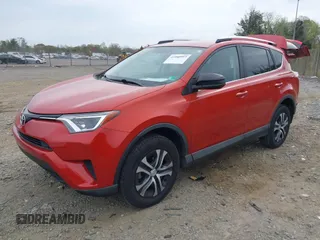 2016 Toyota RAV4 LE with VIN 2T3BFREV6GW516014, listed as a IAAI auction lot 41940997 with 74,129 mi miles. Bid and sale history available at carsss.com. Image 2.