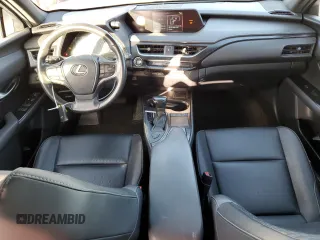 2019 Lexus UX 200 z VIN JTHY3JBH7K2004720, wystawiony jako Copart lot #55961755 z przebiegiem 62 908 mil mil oraz Szkody całkowita. Historia ofert i sprzedaży dostępna na DreamBid. Obrazek 8.