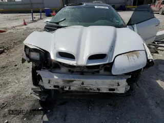 2002 Pontiac Firebird Formula z VIN 2G2FV22G222150957, wystawiony jako Copart lot #48037565 z przebiegiem 112 784 mil mil oraz Szkody całkowita. Historia ofert i sprzedaży dostępna na DreamBid. Obrazek 13.