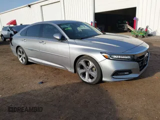 2018 Honda Accord Touring z VIN 1HGCV1F96JA057150, wystawiony jako IAAI lot #41830964 z przebiegiem 97 510 mil mil oraz . Historia ofert i sprzedaży dostępna na DreamBid. Obrazek 1.