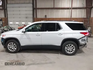 2019 Chevrolet Traverse LT z VIN 1GNEVHKW2KJ223099, wystawiony jako IAAI lot #41755700 z przebiegiem 71 716 mil mil oraz . Historia ofert i sprzedaży dostępna na DreamBid. Obrazek 15.