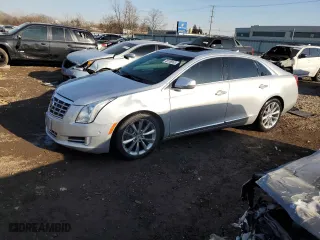 2014 Cadillac XTS Luxury with VIN 2G61M5S34E9154269, listed as a Copart auction lot 48766865 with 119,327 mi miles and Salvage Title. Bid and sale history available at carsss.com. Image 1.