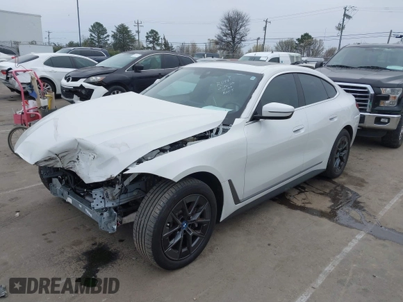 2023 BMW i4 eDrive35 z VIN WBY43AW04PFP70309, wystawiony jako IAAI lot #41745911 z przebiegiem 15 453 mil mil oraz . Historia ofert i sprzedaży dostępna na DreamBid. Obrazek 21.