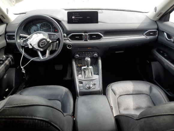 2021 Mazda CX-5 Grand Touring with VIN JM3KFBDM6M0401517, listed as a Copart auction lot 51019645 with 55,906 mi miles and Salvage Title. Bid and sale history available at DreamBid. Image 8.