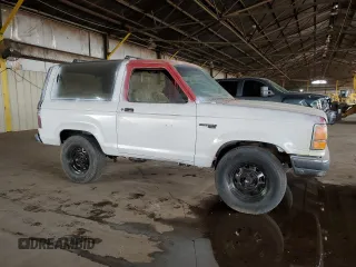 1990 Ford Bronco z VIN 1FMCU14TXLUA68729, wystawiony jako Copart lot #45366995 z przebiegiem 389 150 mil mil oraz Czysty tytuł • Clean title. Historia ofert i sprzedaży dostępna na DreamBid. Obrazek 4.