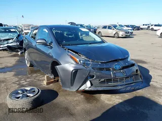 2020 Toyota Prius L Eco z VIN JTDKARFU5L3104460, wystawiony jako IAAI lot #41298045 z przebiegiem 79 412 mil mil oraz . Historia ofert i sprzedaży dostępna na DreamBid. Obrazek 1.