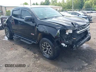 2016 GMC Canyon 4WD SLE z VIN 1GTG6CE35G1171168, wystawiony jako IAAI lot #42275447 z przebiegiem 171 581 mil mil oraz . Historia ofert i sprzedaży dostępna na DreamBid. Obrazek 1.