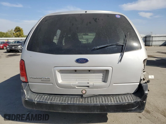 2006 Ford Freestar Cargo z VIN 2FTZA54676BA54418, wystawiony jako Copart lot #77353384 z przebiegiem Nie podano mil oraz Szkoda całkowita • Salvage title. Historia ofert i sprzedaży dostępna na DreamBid. Obrazek 6.