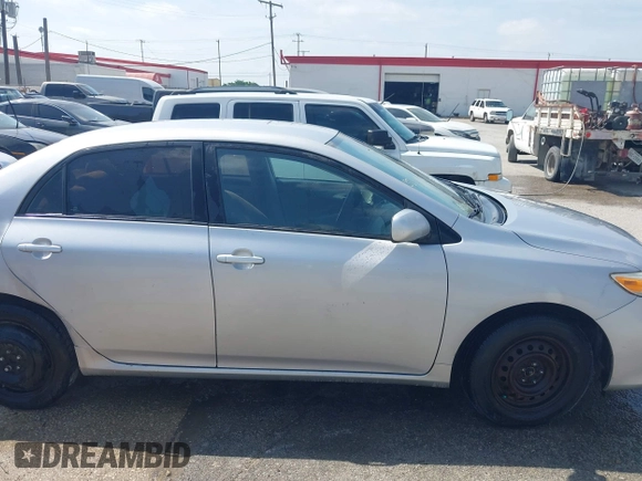 2012 Toyota Corolla L with VIN 2T1BU4EE1CC773885, listed as a IAAI auction lot 42004443 with 192,607 mi miles. Bid and sale history available at carsss.com. Image 13.