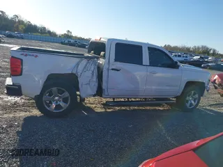 2017 Chevrolet Silverado 1500 LT with VIN 3GCUKREC8HG490827, listed as a IAAI auction lot 41810412 with 121,572 mi miles and . Bid and sale history available at DreamBid. Image 13.