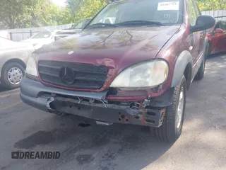 1999 Mercedes-Benz M 320/430/500 with VIN 4JGAB54E5XA127036, listed as a IAAI auction lot 42587793 with 131,129 mi miles and . Bid and sale history available at DreamBid. Image 6.