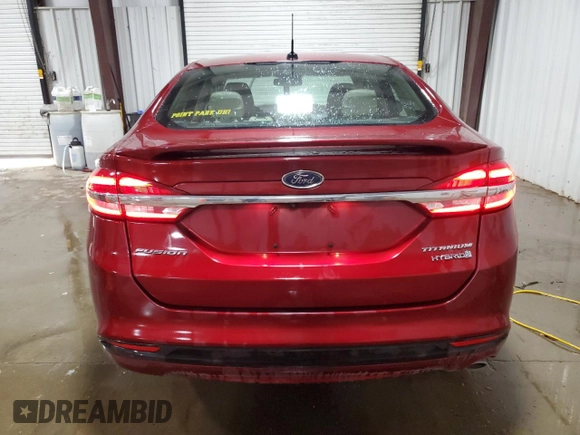 2017 Ford Fusion Hybrid Titanium with VIN 3FA6P0RU2HR394713, listed as a Copart auction lot 56070815 with 95,098 mi miles and Salvage title. Bid and sale history available at DreamBid. Image 6.