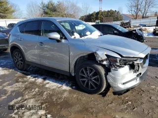 2017 Mazda CX-5 Grand Touring with VIN JM3KFBDL0H0210365, listed as a Copart auction lot 89096995 with 52,549 mi miles and Salvage Title. Bid and sale history available at carsss.com. Image 4.