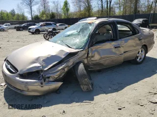 2003 Ford Taurus SEL Deluxe with VIN 1FAHP56SX3G199970, listed as a Copart auction lot 53042795 with 212,802 mi miles and Salvage Title. Bid and sale history available at DreamBid. Image 1.