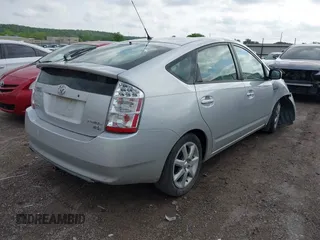 2007 Toyota Prius z VIN JTDKB20U873273942, wystawiony jako IAAI lot #42113046 z przebiegiem 126 635 mil mil oraz . Historia ofert i sprzedaży dostępna na DreamBid. Obrazek 4.