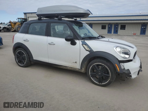 2012 MINI Countryman S with VIN WMWZC5C58CWM13141, listed as a Copart auction lot 48894185 with 128,291 mi miles and Salvage Title. Bid and sale history available at DreamBid. Image 4.