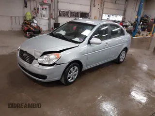 2011 Hyundai Accent GLS z VIN KMHCN4AC1BU605828, wystawiony jako IAAI lot #42129829 z przebiegiem 154 224 mil mil oraz . Historia ofert i sprzedaży dostępna na DreamBid. Obrazek 2.