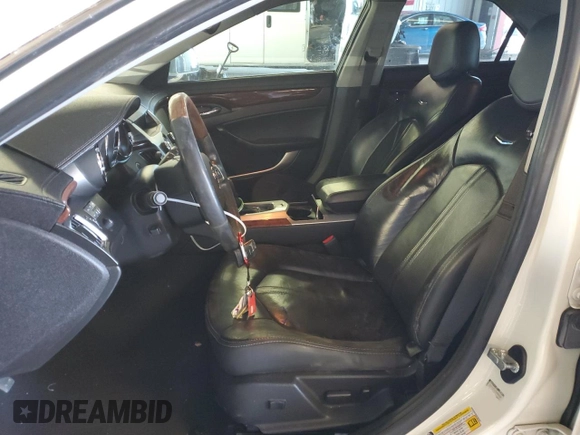 2012 Cadillac CTS Premium with VIN 1G6DS5E39C0150157, listed as a Copart auction lot 87795735 with 127,225 mi miles and Salvage Title. Bid and sale history available at DreamBid. Image 7.