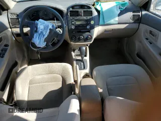 2006 Kia Spectra EX z VIN KNAFE121265353582, wystawiony jako Copart lot #52747635 z przebiegiem 99 087 mil mil oraz Szkoda całkowita • Salvage title. Historia ofert i sprzedaży dostępna na DreamBid. Obrazek 8.