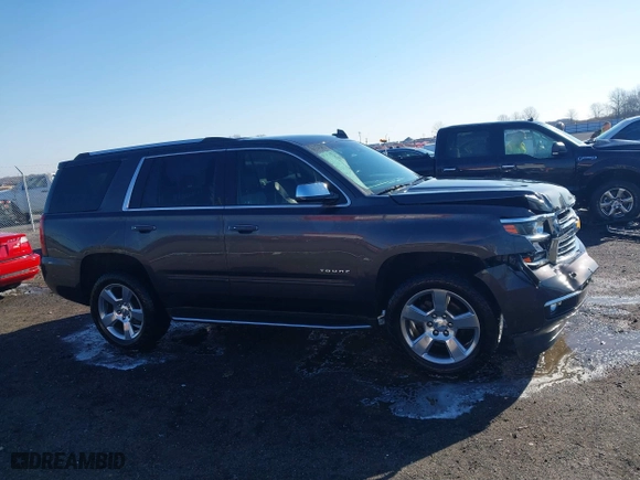 2018 Chevrolet Tahoe Premier with VIN 1GNSCCKC5JR204676, listed as a IAAI auction lot 41731192 with 130,528 mi miles. Bid and sale history available at carsss.com. Image 13.