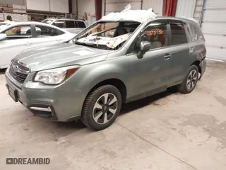 2017 Subaru Forester Limited with VIN JF2SJAJCXHH506180, listed as a IAAI auction lot 41693736 with 83,819 mi miles. Bid and sale history available at carsss.com. Image 2.