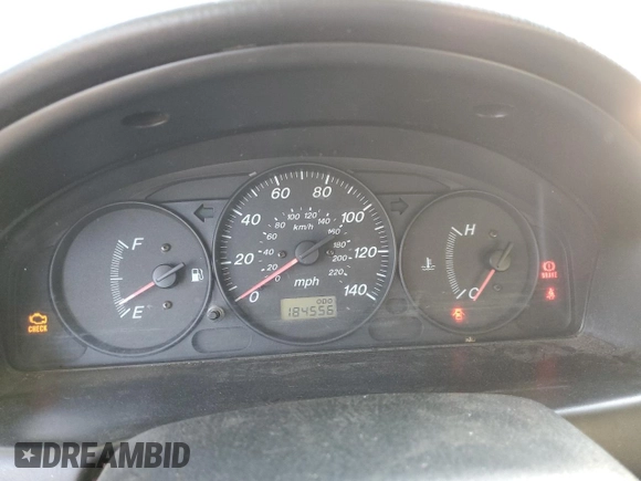 2002 Mazda Protege DX with VIN JM1BJ225120605237, listed as a Copart auction lot 49331225 with 184,556 mi miles and Salvage Title. Bid and sale history available at DreamBid. Image 9.