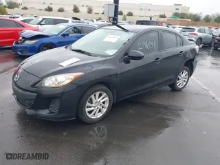2012 Mazda Mazda3 i Touring with VIN JM1BL1VG5C1506157, listed as a IAAI auction lot 41629654 with 144,475 mi miles. Bid and sale history available at carsss.com. Image 2.