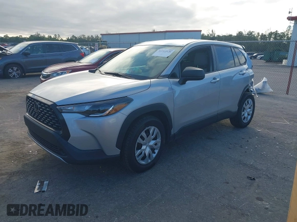 2022 Toyota Corolla Cross L with VIN 7MUAAAAG6NV010688, listed as a IAAI auction lot 41212520 with 50,075 mi miles and . Bid and sale history available at DreamBid. Image 2.
