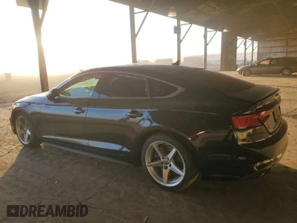 2018 Audi A5 Sportback Premium with VIN WAUDNCF52JA004082, listed as a Copart auction lot 87002474 with 84,790 mi miles and Salvage Title. Bid and sale history available at carsss.com. Image 2.