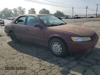 1998 Toyota Camry LE с VIN 4T1BG22K3WU313572, выставлен на аукционе Copart как лот 60435655 с пробегом 246 229 миль миль и Списание • Salvage title. История ставок и продаж доступна на DreamBid. Изображение 4.
