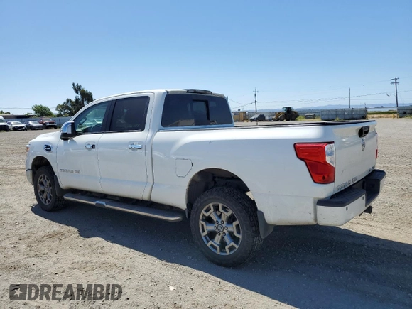 2017 Nissan Titan Pro-4X z VIN 1N6BA1F40HN559615, wystawiony jako Copart lot #57636455 z przebiegiem 99 803 mil mil oraz Szkoda całkowita • Salvage title. Historia ofert i sprzedaży dostępna na DreamBid. Obrazek 2.
