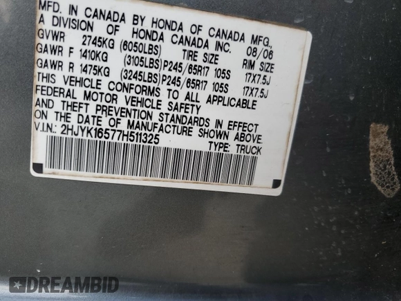 2007 Honda Ridgeline RTL z VIN 2HJYK16577H511325, wystawiony jako Copart lot #57619725 z przebiegiem 161 037 mil mil oraz Szkoda całkowita • Salvage title. Historia ofert i sprzedaży dostępna na DreamBid. Obrazek 13.