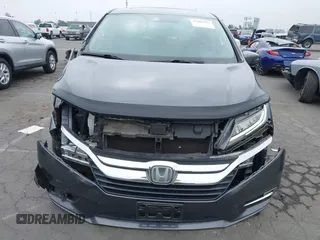 2018 Honda Odyssey Touring with VIN 5FNRL6H88JB062213, listed as a IAAI auction lot 42489379 with 90,578 mi miles and . Bid and sale history available at DreamBid. Image 13.