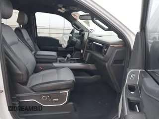 2023 Ford F-150 Lightning Pro z VIN 1FTVW1EL7PWG19070, wystawiony jako IAAI lot #41536193 z przebiegiem 22 654 mil mil oraz . Historia ofert i sprzedaży dostępna na DreamBid. Obrazek 5.