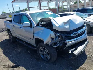 2015 Chevrolet Colorado 4WD LT with VIN 1GCGTBE36F1125107, listed as a IAAI auction lot 39514133 with 105,116 mi miles. Bid and sale history available at carsss.com. Image 1.
