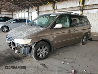 2004 Honda Odyssey EX-L with VIN 5FNRL18094B060746, listed as a Copart auction lot 63875845 with 218,225 mi miles and Salvage title. Bid and sale history available at DreamBid. Image 1.
