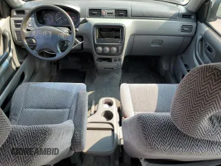 1998 Honda CR-V EX z VIN JHLRD1864WC107475, wystawiony jako Copart lot #59886595 z przebiegiem 211 972 mil mil oraz Szkoda całkowita • Salvage title. Historia ofert i sprzedaży dostępna na DreamBid. Obrazek 8.