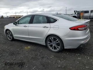 2019 Ford Fusion Titanium with VIN 3FA6P0D99KR242616, listed as a Copart auction lot 57525635 with 79,518 mi miles and Salvage title. Bid and sale history available at DreamBid. Image 2.