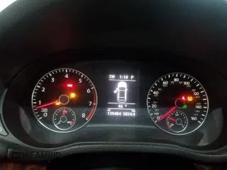 2013 Volkswagen Passat SEL Premium z VIN 1VWCP7A30DC100014, wystawiony jako Copart lot #55271515 z przebiegiem 139 484 mil mil oraz Szkoda całkowita • Salvage title. Historia ofert i sprzedaży dostępna na DreamBid. Obrazek 9.