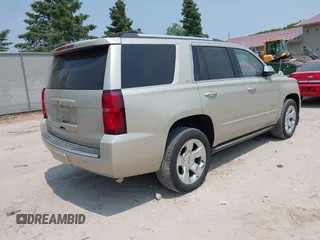 2015 Chevrolet Tahoe LTZ z VIN 1GNSKCKC0FR113647, wystawiony jako IAAI lot #42288089 z przebiegiem 113 322 mil mil oraz . Historia ofert i sprzedaży dostępna na DreamBid. Obrazek 4.