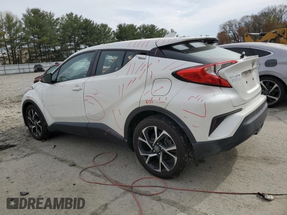 2019 Toyota C-HR XLE z VIN NMTKHMBX7KR073500, wystawiony jako Copart lot #53596395 z przebiegiem 91 934 mil mil oraz Szkoda całkowita • Salvage title. Historia ofert i sprzedaży dostępna na DreamBid. Obrazek 2.