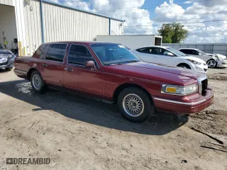 1996 Lincoln Town Car Signature with VIN 1LNLM82W3TY725921, listed as a Copart auction lot 72569054 with 109,073 mi miles and Salvage Title. Bid and sale history available at carsss.com. Image 4.