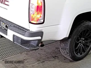 2021 GMC Canyon 2WD Elevation z VIN 1GTG5CEN5M1140499, wystawiony jako IAAI lot #42556124 z przebiegiem 41 450 mil mil oraz . Historia ofert i sprzedaży dostępna na DreamBid. Obrazek 13.