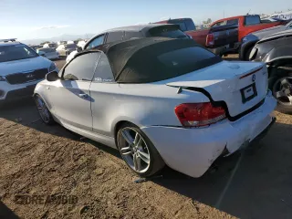 2010 BMW 1 Series 135i with VIN WBAUN9C57AVK41344, listed as a Copart auction lot 72216844 with 122,145 mi miles and Salvage Title. Bid and sale history available at carsss.com. Image 2.