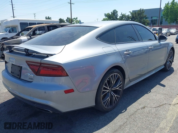 2018 Audi A7 Premium Plus z VIN WAUW3AFC1JN026763, wystawiony jako IAAI lot #42359297 z przebiegiem 108 937 mil mil oraz . Historia ofert i sprzedaży dostępna na DreamBid. Obrazek 4.