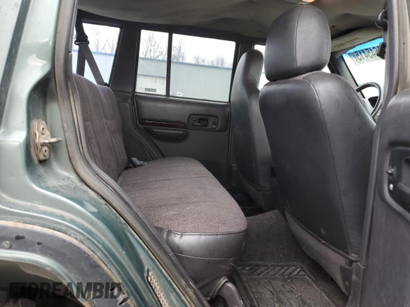 2000 Jeep Cherokee Classic with VIN 1J4FF58S3YL104384, listed as a Copart auction lot 46645415 with 253,730 mi miles and Salvage Title. Bid and sale history available at carsss.com. Image 10.