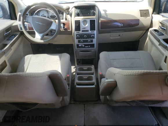 2010 Chrysler Town & Country LX with VIN 2A4RR4DE0AR188949, listed as a Copart auction lot 54140515 with 185,534 mi miles and Salvage Title. Bid and sale history available at DreamBid. Image 8.