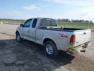 1999 Ford F-150 XL with VIN 2FTRX18L7XCA69231, listed as a IAAI auction lot 41880011 with 1 mi miles. Bid and sale history available at carsss.com. Image 3.