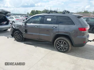 2018 Jeep Grand Cherokee Trailhawk with VIN 1C4RJFLG8JC427345, listed as a IAAI auction lot 41557222 with 49,469 mi miles and . Bid and sale history available at DreamBid. Image 3.